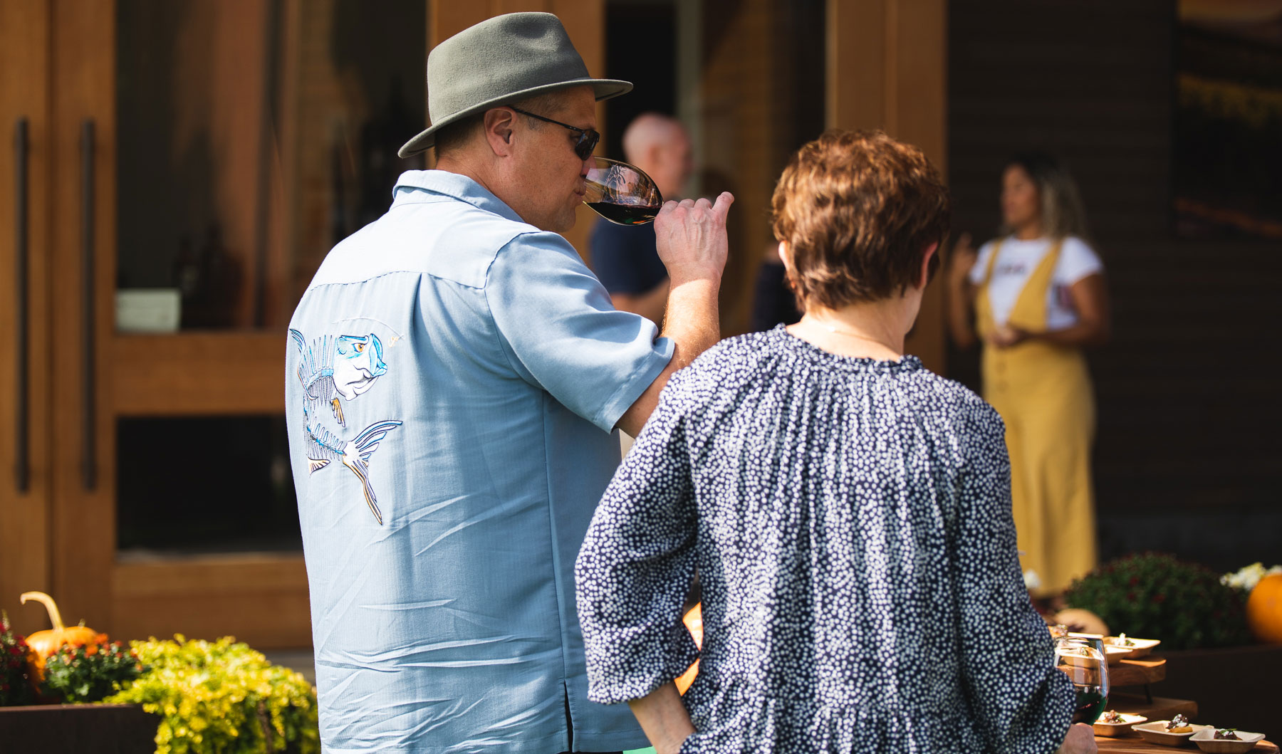 Couple tasting wine at Canvasback's Fall Release Weekend Event