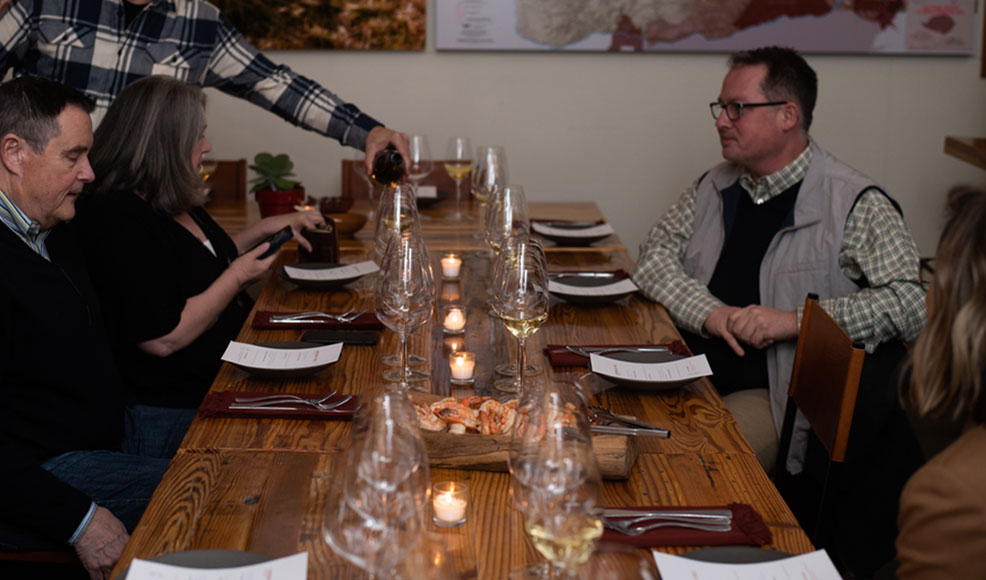 Canvasback Winter Dinner Series, people and wine at a table