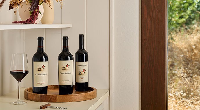 Canvasback wine on a wine barrel