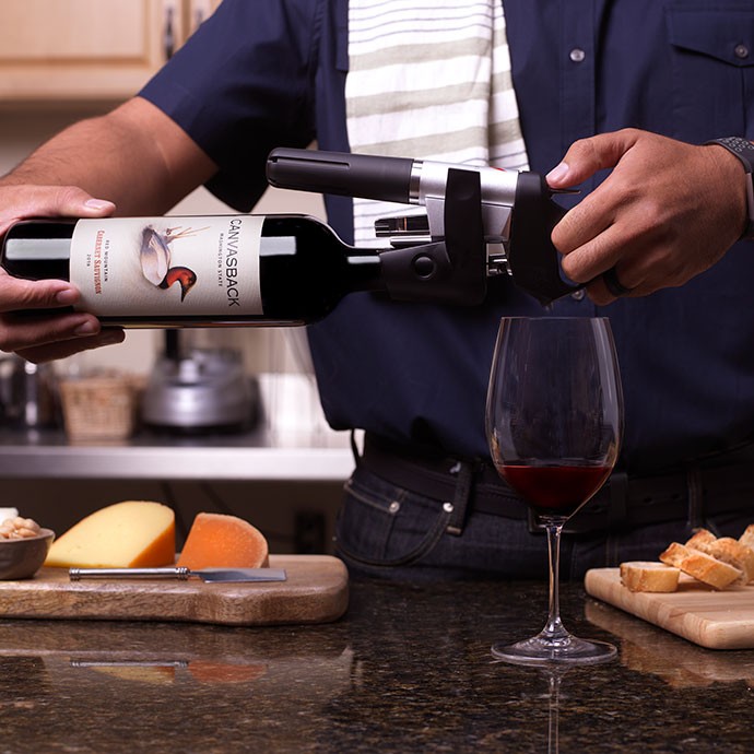 Canvasback wine being coravin
