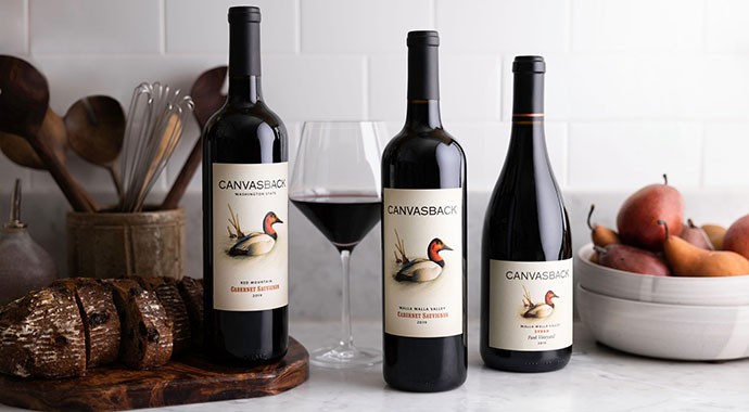 Canvasback wine on the counter with bread